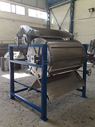 Large-scale industrial magnetic drum separator mounted on a heavy-duty blue chassis.