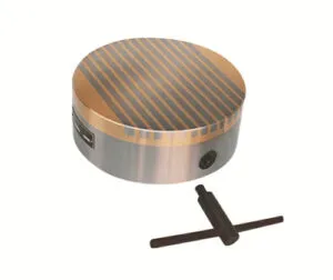 Close-up of a waterproof electromagnetic chuck with a mirror-finish surface, designed to provide a uniform magnetic field for high-precision machining.